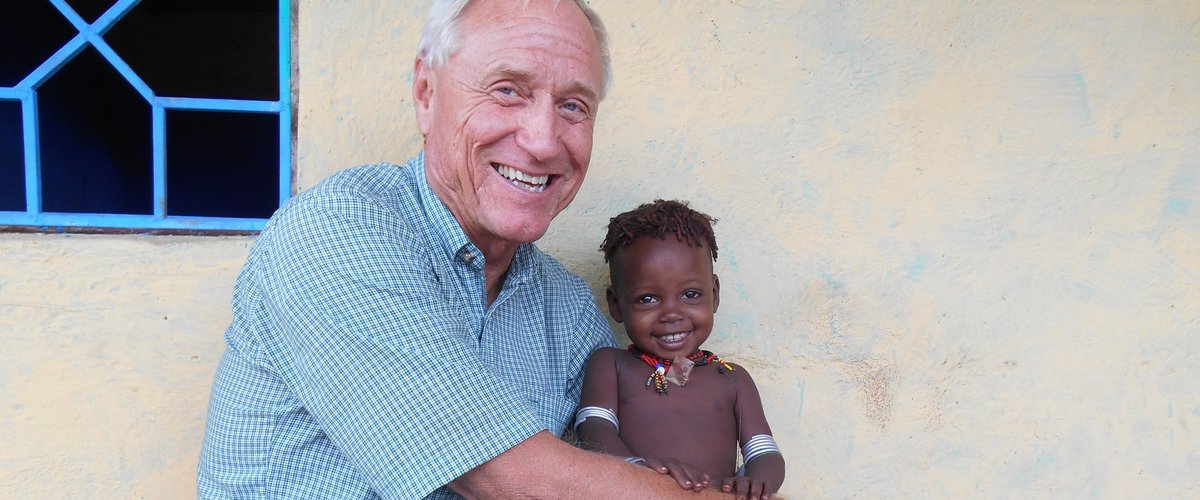 Barry Hewlett with Hamar child
